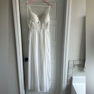 Ivory full length dress. Lace bodice with boning